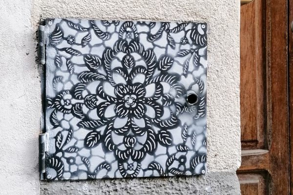 NeSpoon and her lace stencils in Cefalù, Sicily
